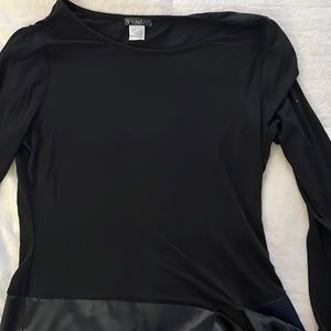 Venus Black long sleeve tunic with satin like bottom that toes on side.